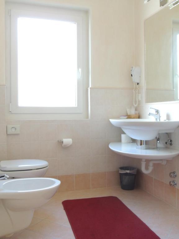 Liz Hotel & Apartments Predazzo Habitación foto